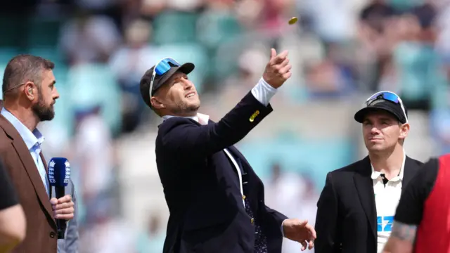 Joe Root tosses coin in there air as England win the Toss