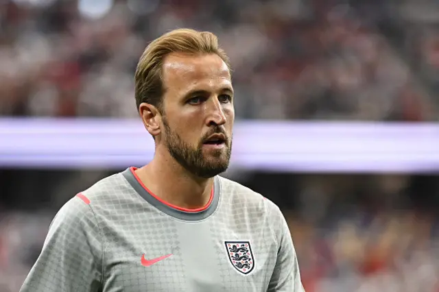 Harry Kane walks on the pitch