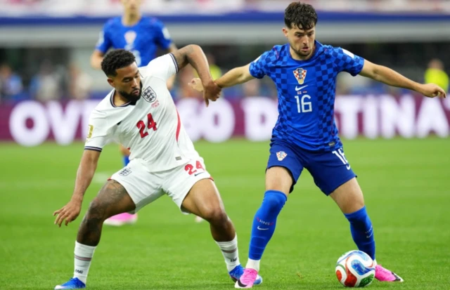England's Reece James (left) and Croatia's Martin Baturina battle for the ball