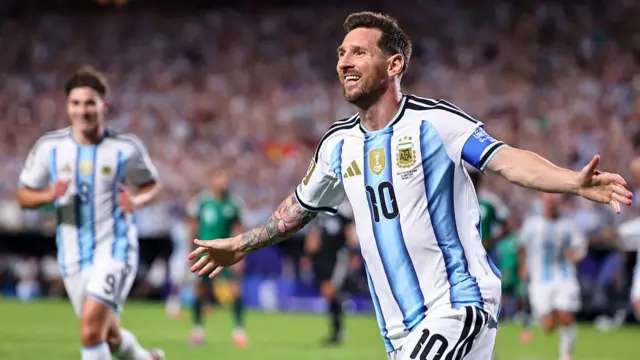 Lionel Messi celebrates scoring
