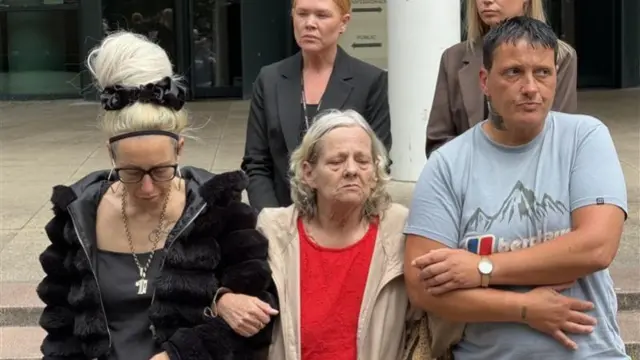 Families on court steps