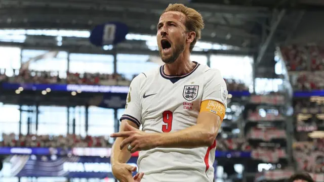 Harry Kane of England celebrates scoring his team's second goal