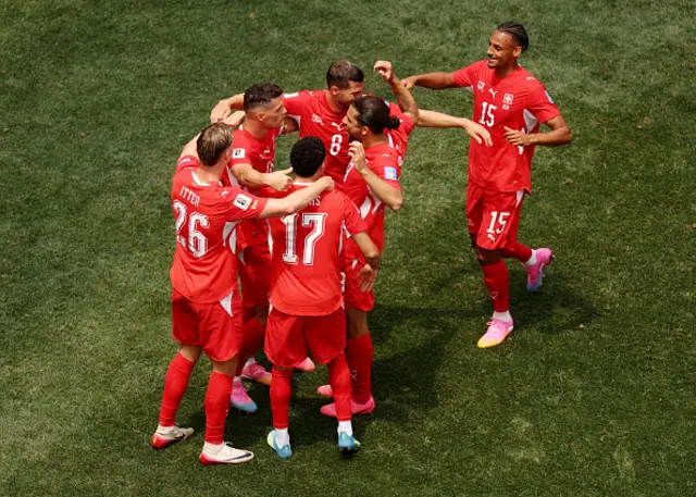 Granit Xhaka #10 of Switzerland celebrates with teammates