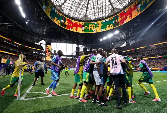 Teboho Mokoena #4 of South Africa celebrates