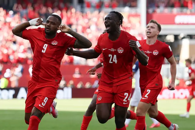 Canada celebrate their equaliser against Bosnia