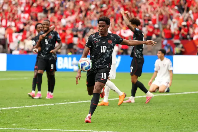 onathan David #10 of Canada celebrates scoring his team's second goal during the FIFA World Cup 2026 Group B match between Canada and Qatar