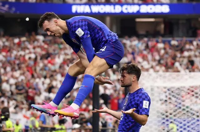 Martin Baturina of Croatia celebrates with Ivan Perisic