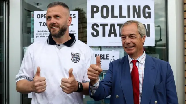Reform UK leader Nigel Farage and candidate Robert Kenyon, pictured earlier today