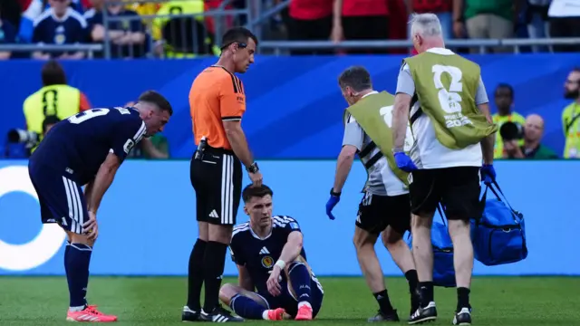Kieran Tierney receiving treatment