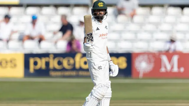 Notts skipper Haseeb Hameed acknowledges his 50 by raising his bat