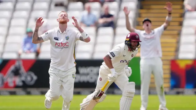 Ben Stokes throws his hands to the sky as he comes close to taking a wicket