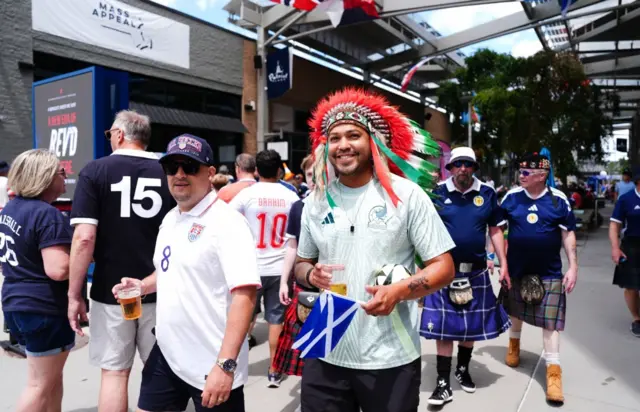 Moroccan fans mix with Scottish fans at the Boston Stadium