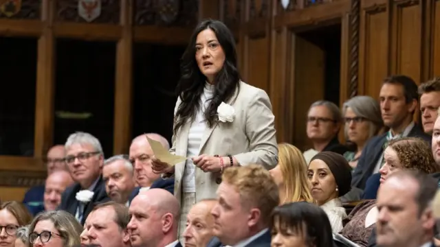 Sarah Owen in the House of Commons, she has long black hair and is wearing an off-white suit jacket.