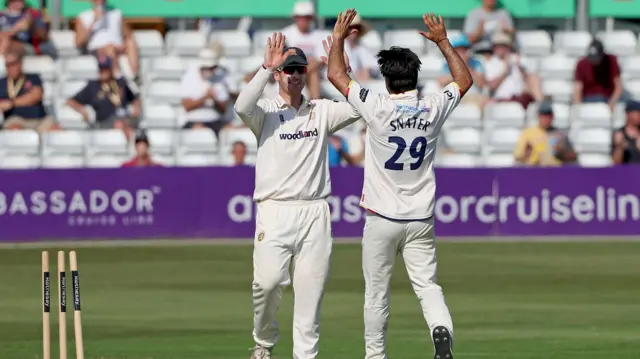 Shane Snater celebrates bowling Freddie McCann