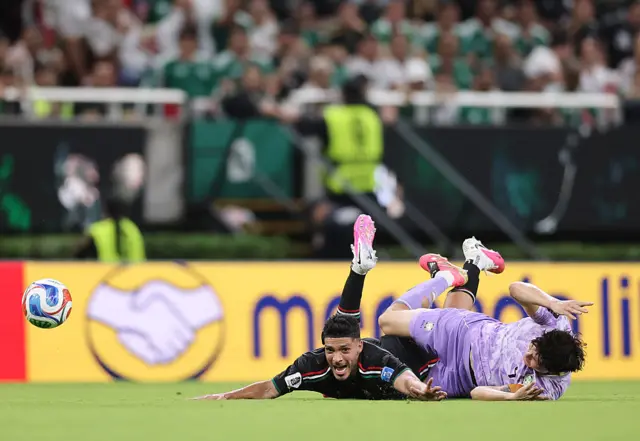 Raul Jimenez #9 of Mexico is challenged by Min-Jae Kim #4 of Korea Republic during the FIFA World Cup 2026 Group A match between Mexico and Korea Republic