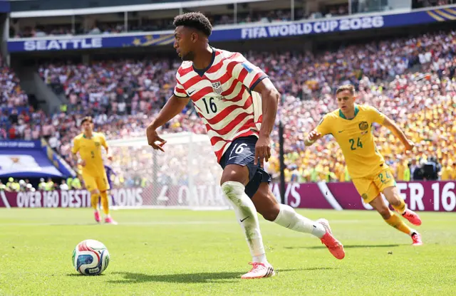 Alex Freeman controls the ball