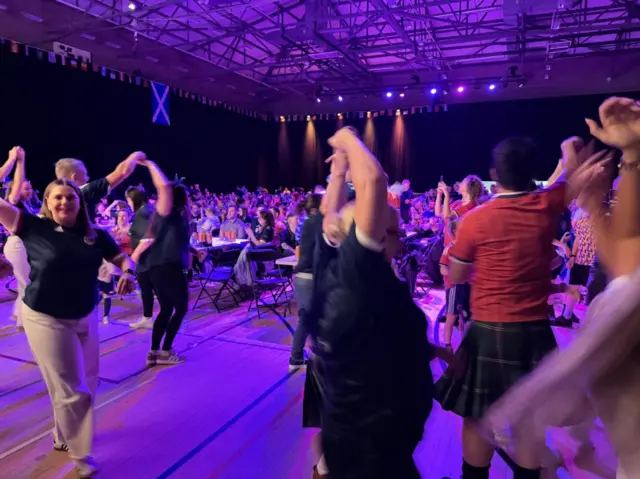 An impromptu ceilidh is taking place at the Inverness fanzone