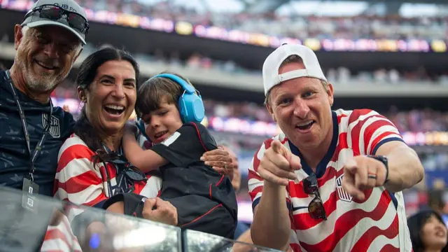 USA fans celebrate a goal against Paraguay