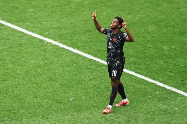 Jonathan David #10 of Canada celebrates scoring his team's third goal during the FIFA World Cup 2026 Group B match between Canada and Qatar