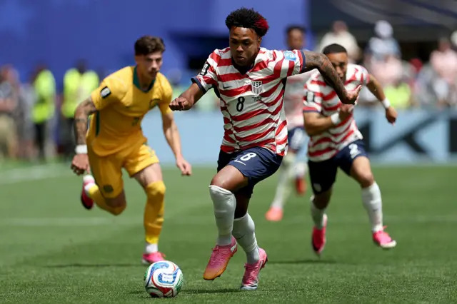 Weston McKennie runs with the ball