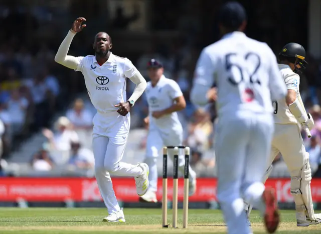 England's Hoffa Archer celebrates after dismissing New Zealand captain Tom Latham