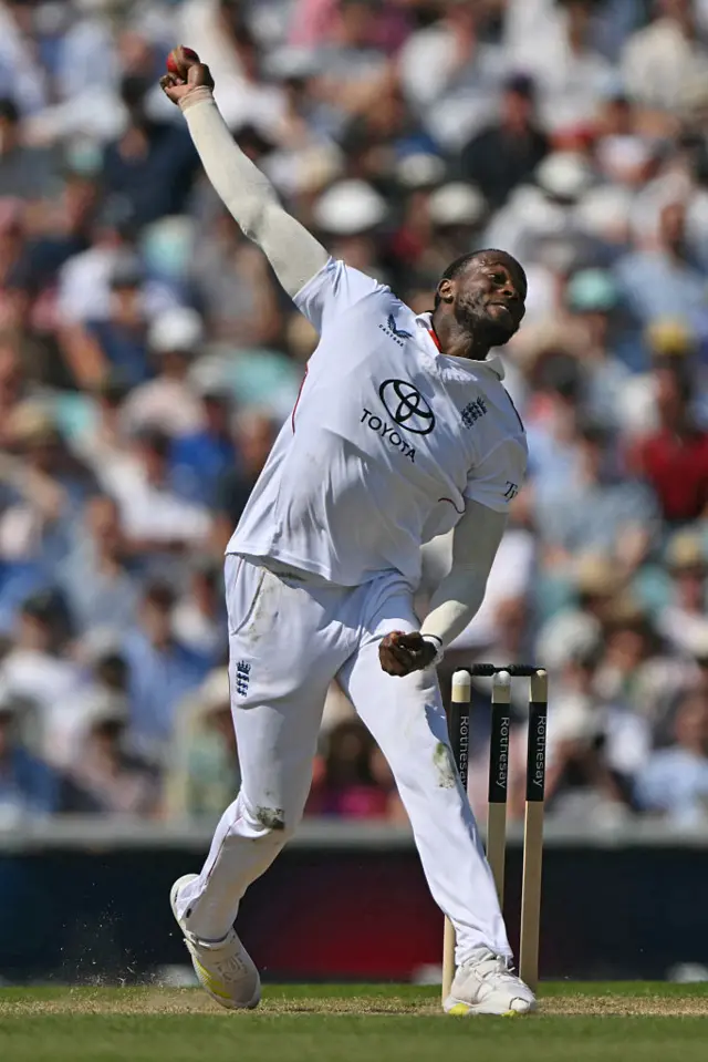 Jofra Archer bowls towards Henry Nicholls.