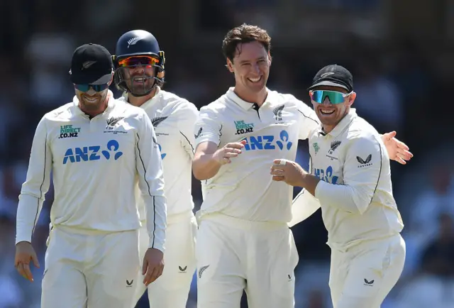 New Zealand team celebrate taking another wicket