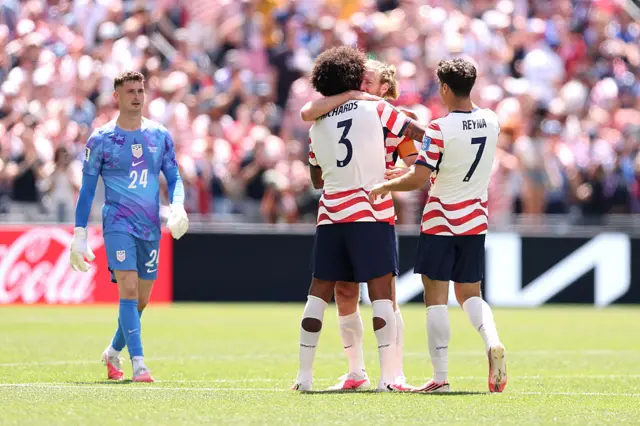 Chris Richards, Tim Ream and Giovanni Reyna celebrate