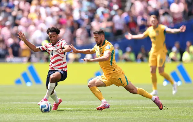 Tyler Adams and Mathew Leckie