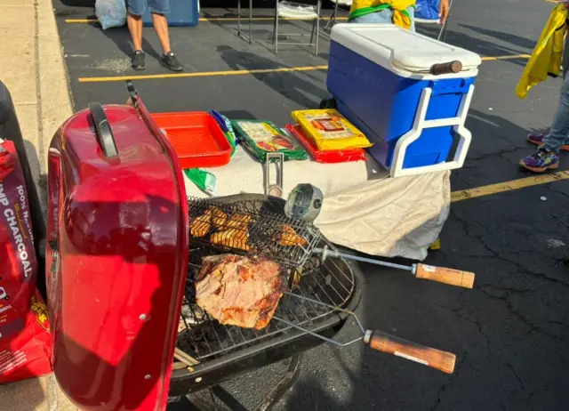 Meat cooks on a barbecue