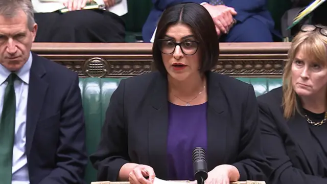 Home Secretary Mahmood peaking in the Commons