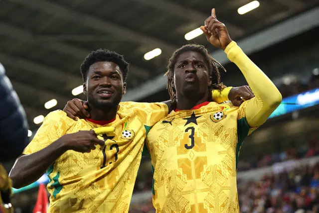 Caleb Yirenkyi of Ghana (right) celebrates with team mate Christopher Baah