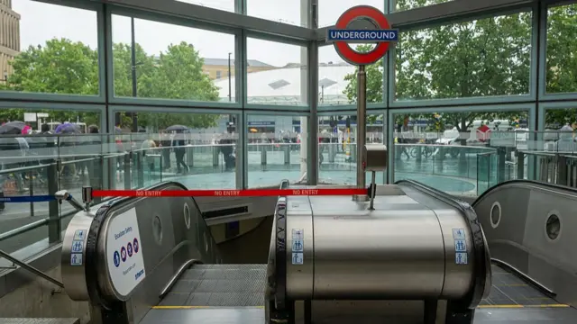 An empty escalator at King's Cross station