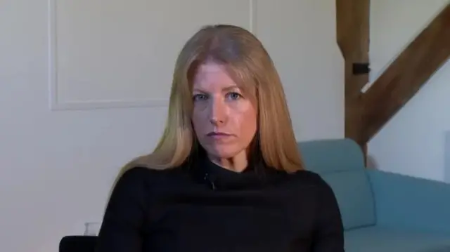 Hampshire Police and Crime Commissioner Donna Jones in a living room with a chair behind her