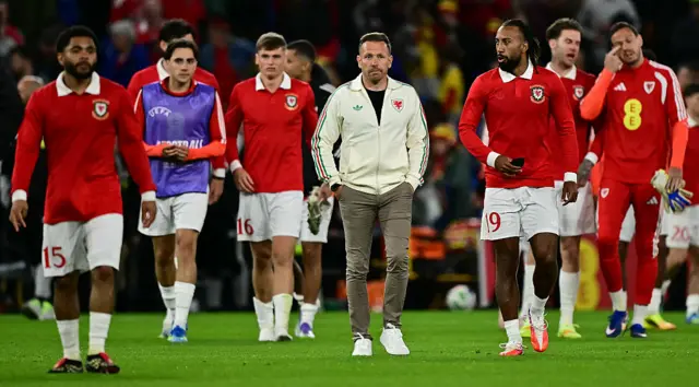 Wales boss Craig Bellamy with players