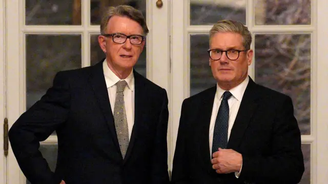 Keir Starmer (R) and Lord Mandelson during a welcome reception at the ambassador's residence in Washington DC in February 2025