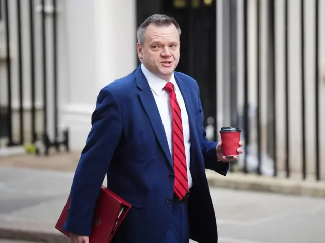l Nick Thomas-Symonds arriving in Downing Stree holding a red folder