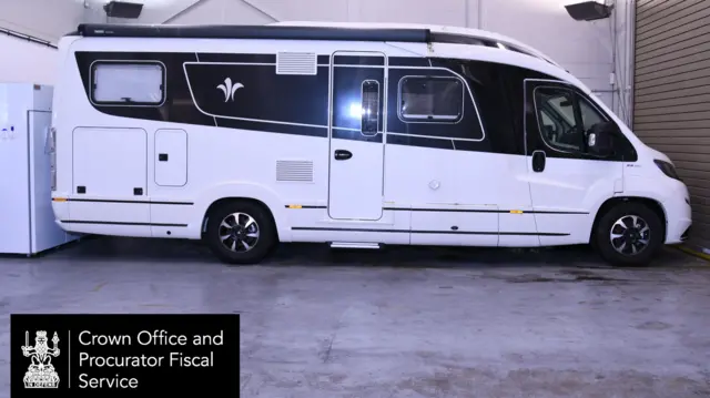 A black and white motorhome