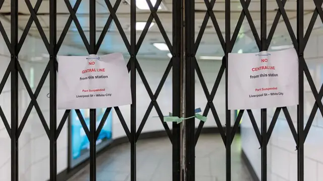 A sign that says Central line gates are closed