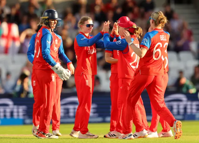 Charlie Dean celebrates the wicket of Katherine Fraser