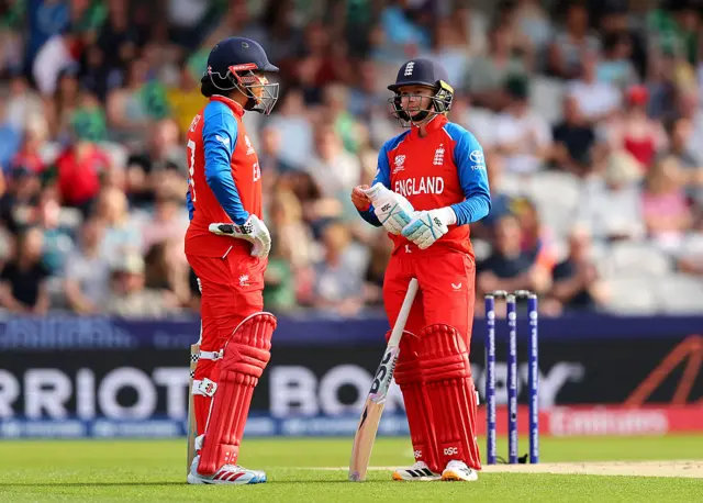Sophia Dunkley and Danni Wyatt-Hodge of England interacts between the wickets during the ICC Women's T20 World Cup Group B match between England and Scotland at Headingley