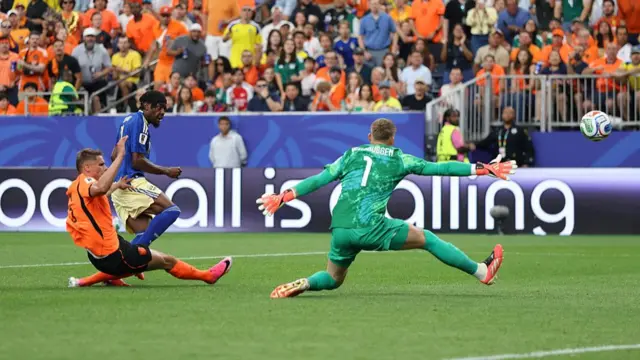 Anthony Elanga of Sweden scores