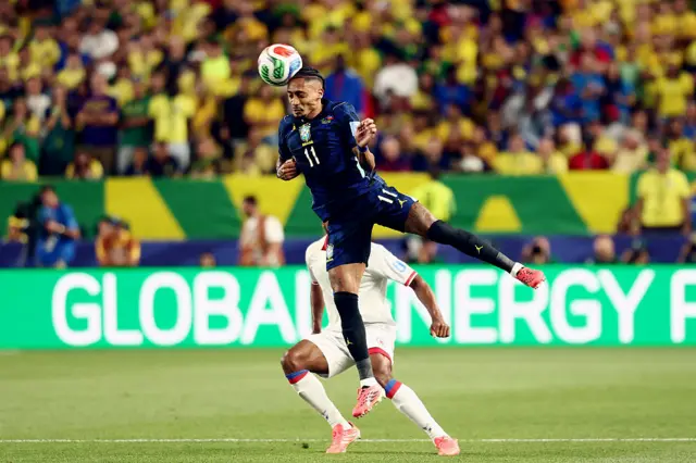 Raphinha jumps for the ball during the 2026 World Cup Group C football match between Brazil and Haiti at the Philadelphia Stadium in Philadelphia on June 19, 2026