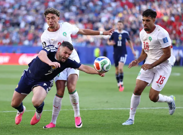 John McGinn goes down in the box