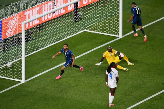 Matheus Cunha (L) celebrates scoring his team's first goal during the 2026 World Cup Group C football match between Brazil and Haiti at the Philadelphia Stadium