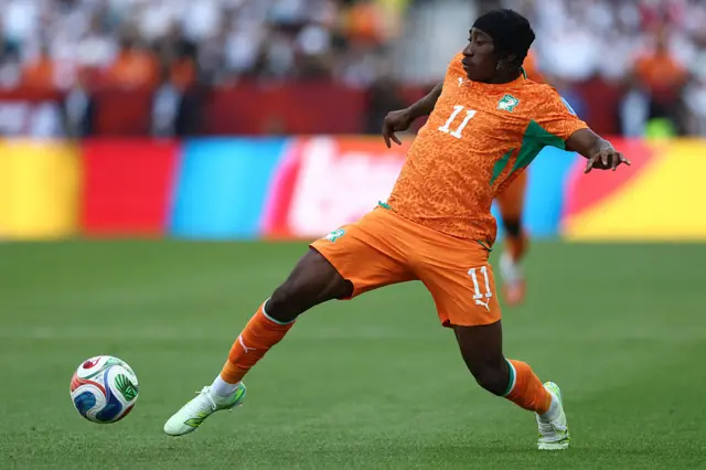 Yan Diomande controls the ball