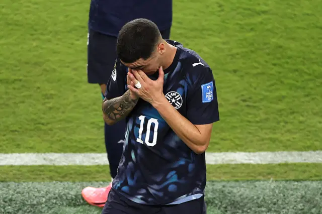 Miguel Almiron #10 of Paraguay reacts after receiving a red card for covering his mouth while talking to another player during the FIFA World Cup 2026 Group D match between Türkiye and Paraguay