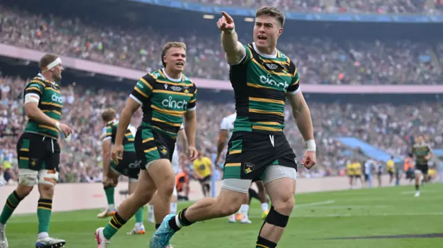 Tommy Freeman celebrates scoring try