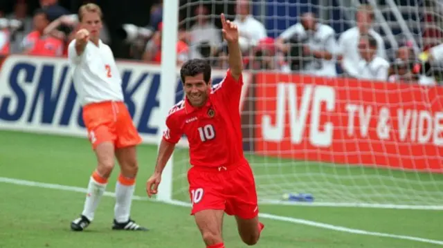 Enzo Scifo celebrates the only goal with his hand in the air and one finger raised as Belgium overcame the Netherlands at the 1994 World Cup