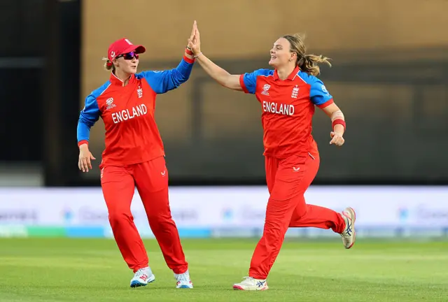 Dani Gibson celebrates a wicket with Alice Capsey
